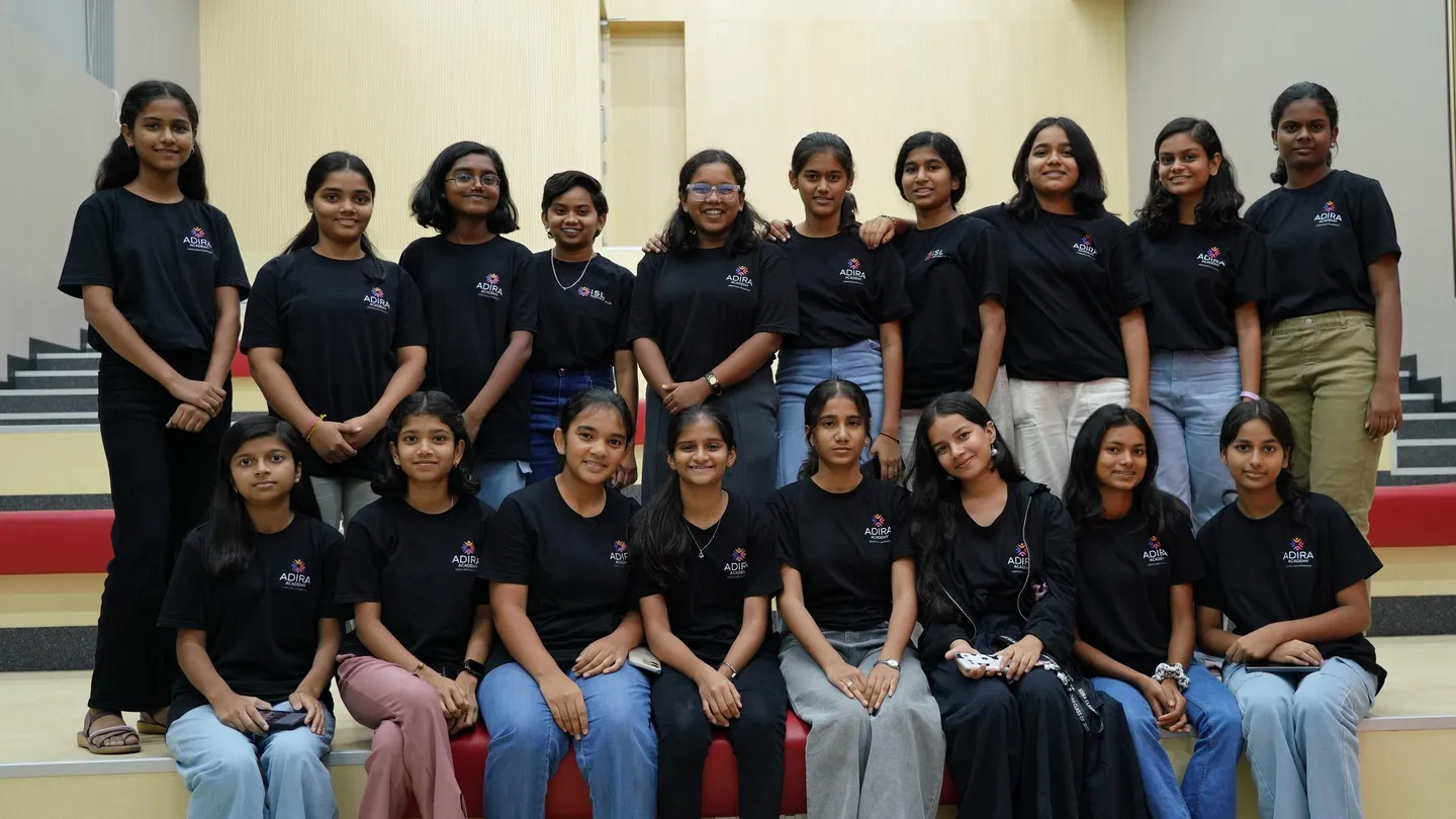 Adira students on auditorium steps