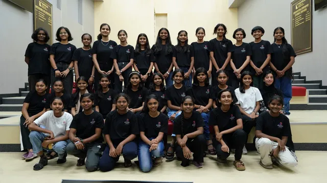 Adira students on auditorium steps