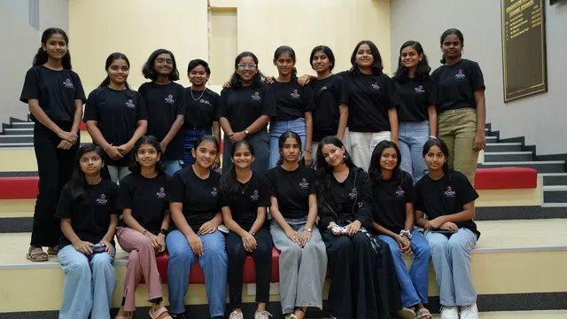 Adira students on auditorium steps