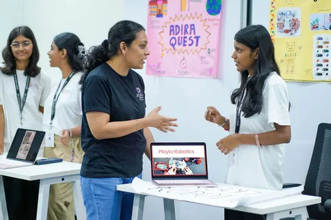 A student showing her robotics project